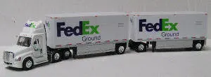 Freightliner Cascadia Day Cab Towing Dual 28-Foot Drop Deck Trailers – Fedex Fleet 1